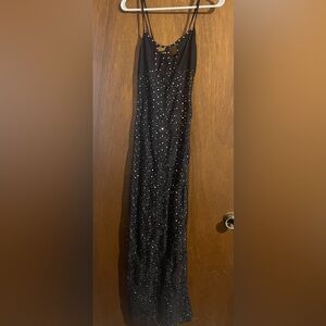 Custom Sheer Black Dancer Gown with Rhinestone Accents and Two Thigh High Slits.